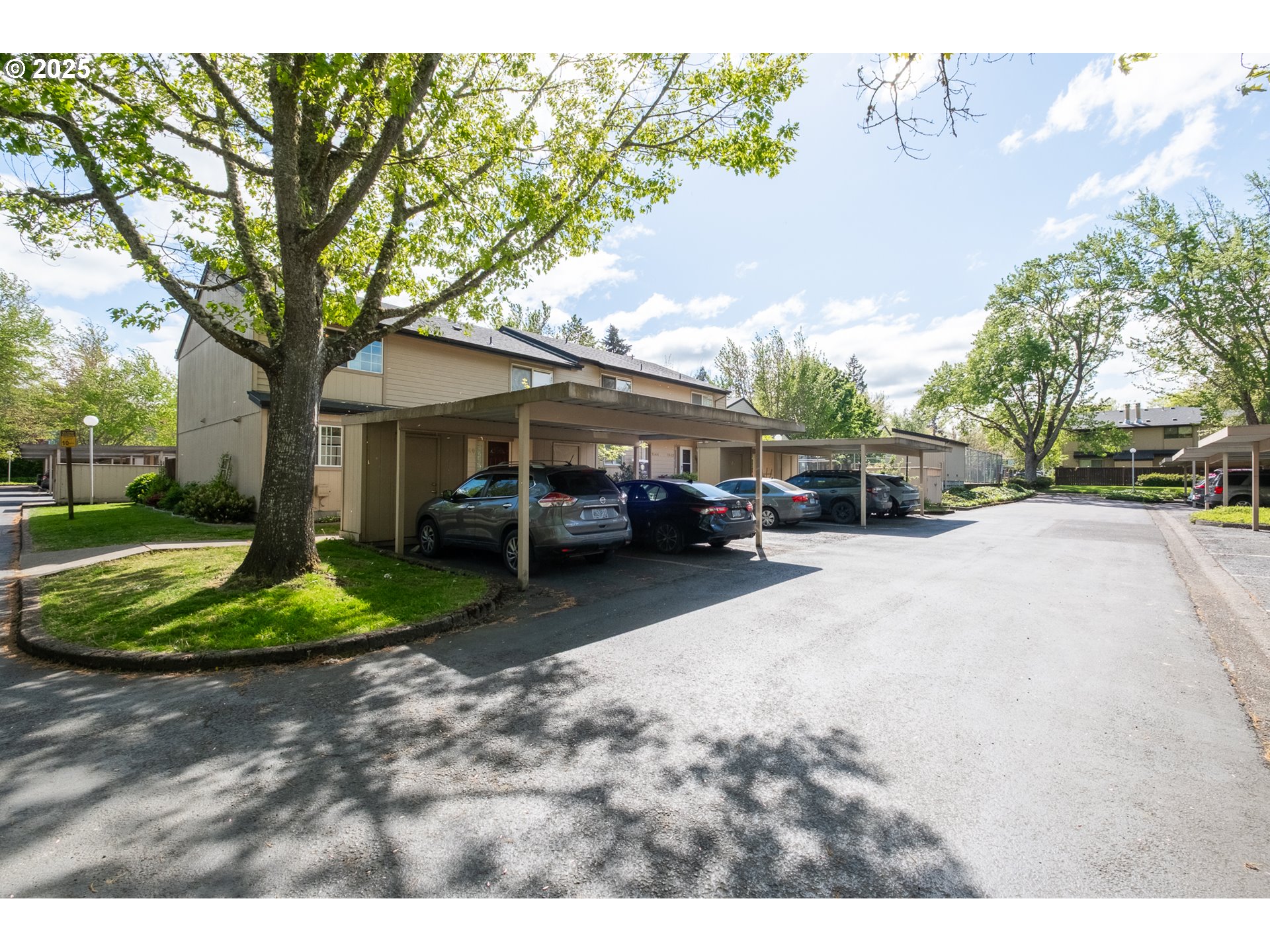 1548 Fetters Loop Eugene, OR 97402 - Photo 3 of 33 a view of street with parked cars