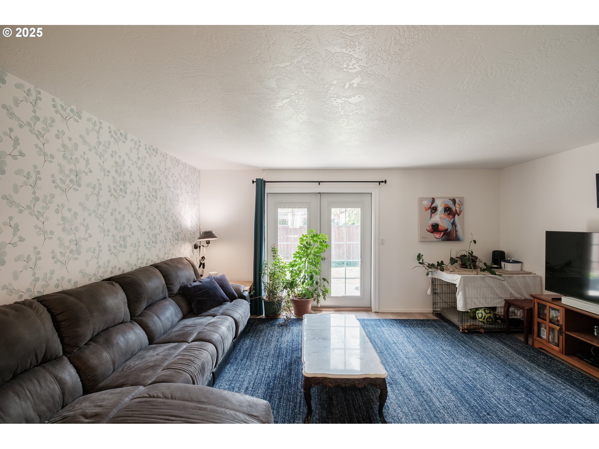 1548 Fetters Loop Eugene, OR 97402 - Photo 10 of 33 a living room with furniture and a flat screen tv