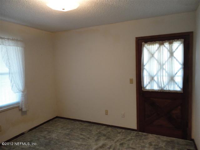 284 Barrataria Drive St. Augustine, FL 32080 - Photo 14 of 24 an empty room with windows