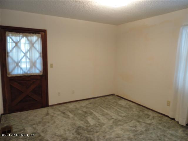 284 Barrataria Drive St. Augustine, FL 32080 - Photo 16 of 24 an empty room with windows