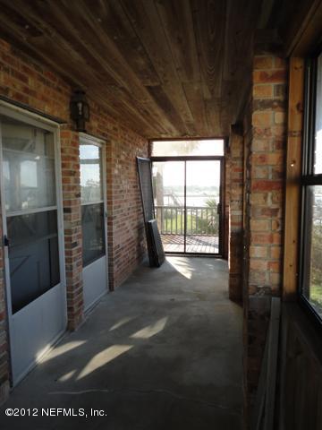 284 Barrataria Drive St. Augustine, FL 32080 - Photo 17 of 24 a view of an empty room with a window