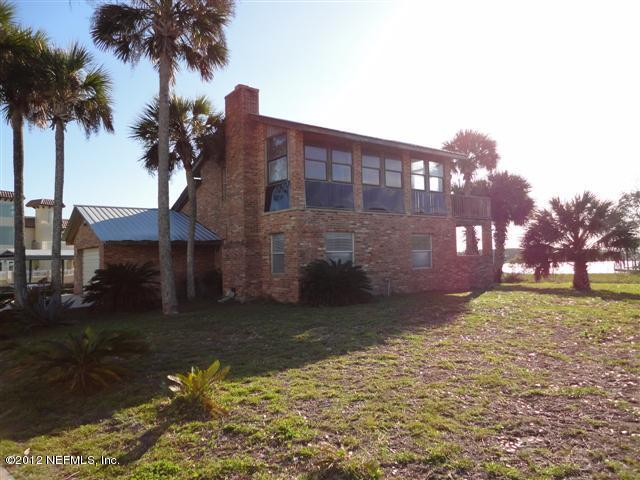 284 Barrataria Drive St. Augustine, FL 32080 - Photo 19 of 24 a view of a yard with a house