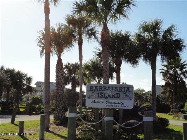 284 Barrataria Drive St. Augustine, FL 32080 - Photo 24 of 24 a sign that is sitting in front of a house with trees