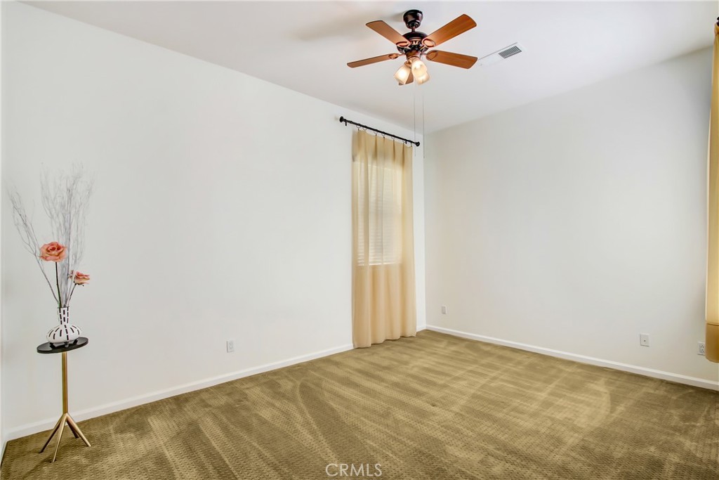 36109 Eagle Lane Beaumont, CA 92223 - Photo 20 of 42 a view of a big room with carpet