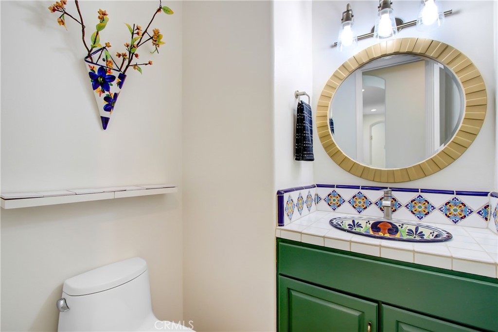 36109 Eagle Lane Beaumont, CA 92223 - Photo 25 of 42 a bathroom with a toilet and a sink