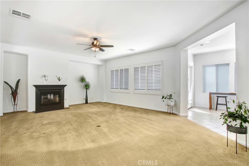36109 Eagle Lane Beaumont, CA 92223 - Photo 7 of 42 a view of an empty room with a fireplace