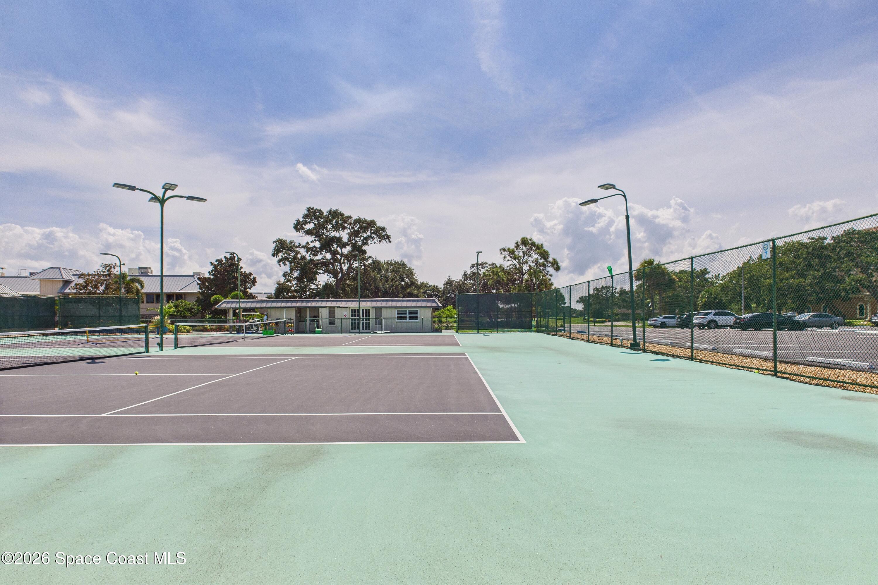 204 Country Club Drive Melbourne, FL 32940 - Photo 23 of 63 a view of a tennis court
