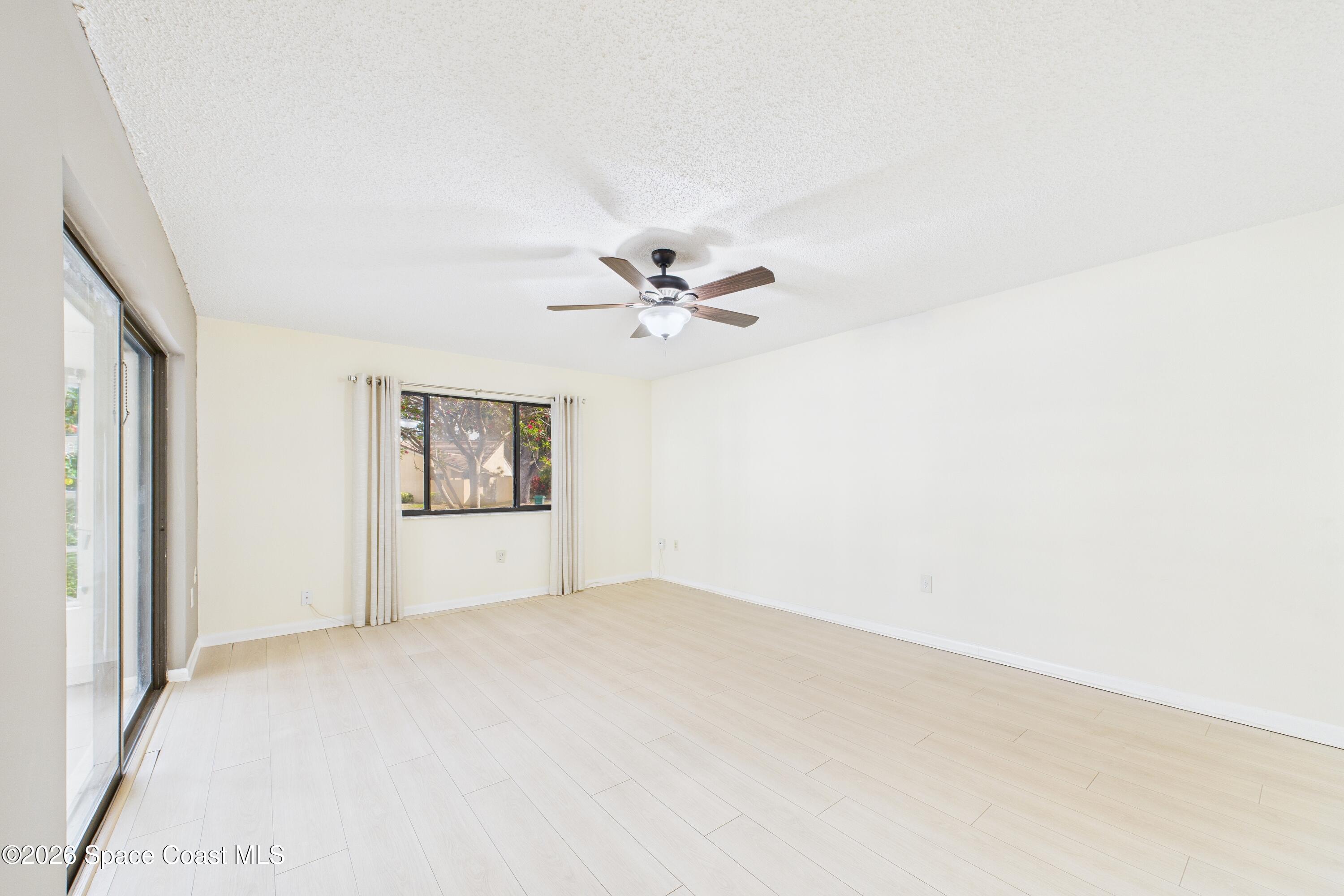 204 Country Club Drive Melbourne, FL 32940 - Photo 46 of 63 a view of a room with a fan