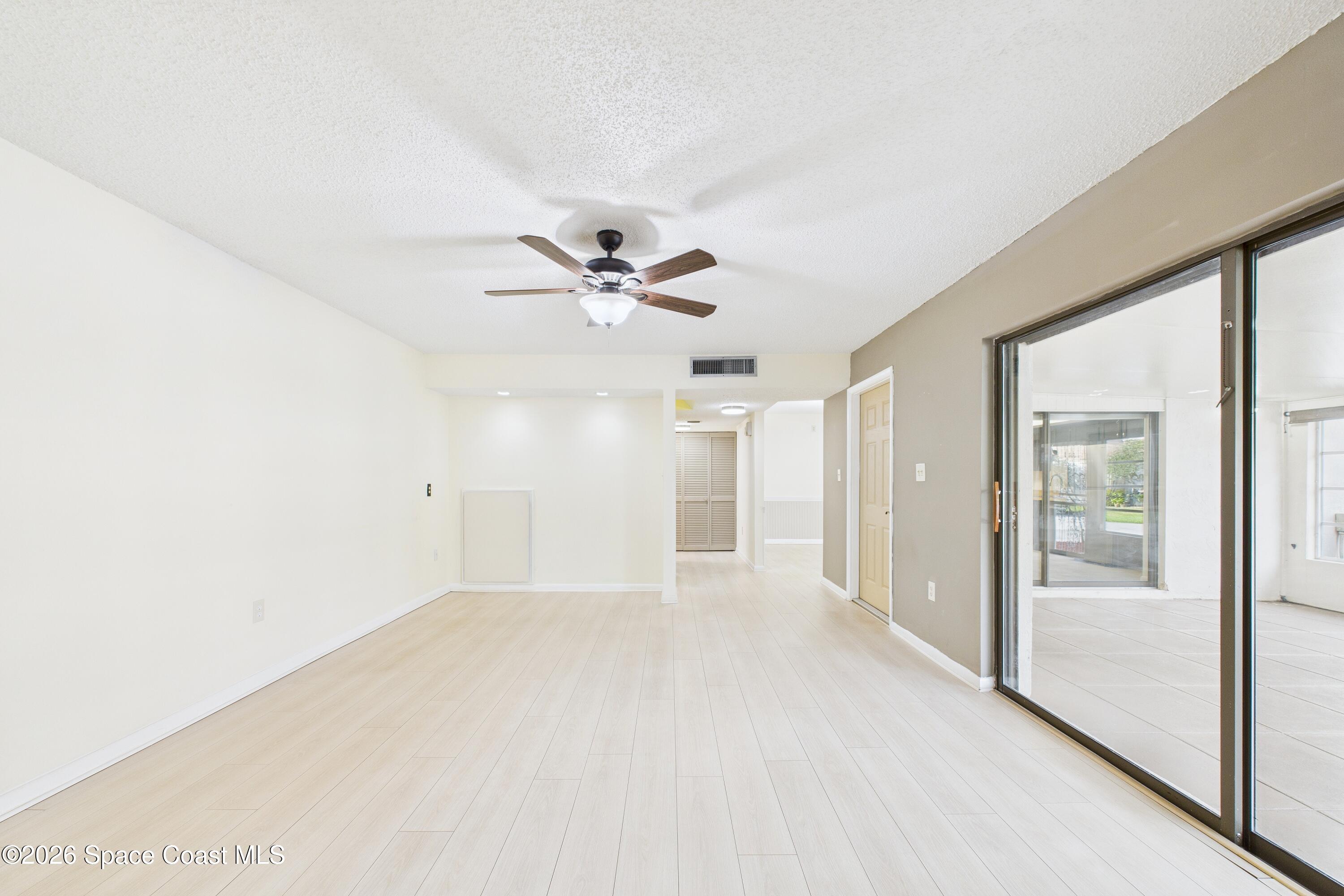 204 Country Club Drive Melbourne, FL 32940 - Photo 47 of 63 a view of an empty room with a window