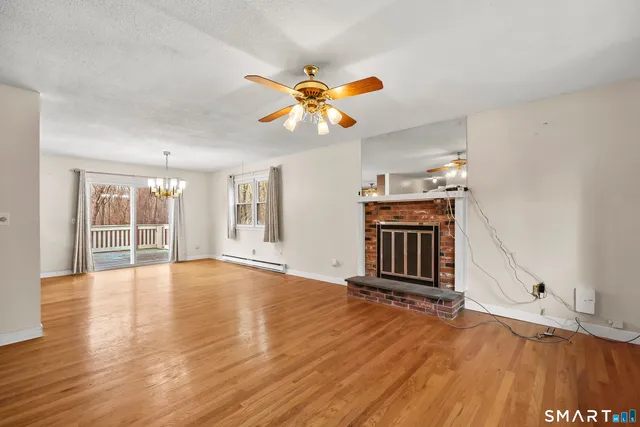 a kitchen with stainless steel appliances granite countertop a sink dishwasher stove top oven and refrigerator