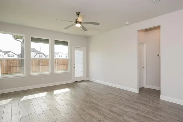 a picture of a room with windows