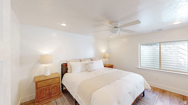 368 East 700 North Springville, UT 84663 - Photo 24 of 55 Bedroom featuring wood finished floors, a ceiling fan, and recessed lighting