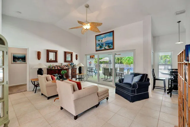 a living room with fireplace furniture and a flat screen tv