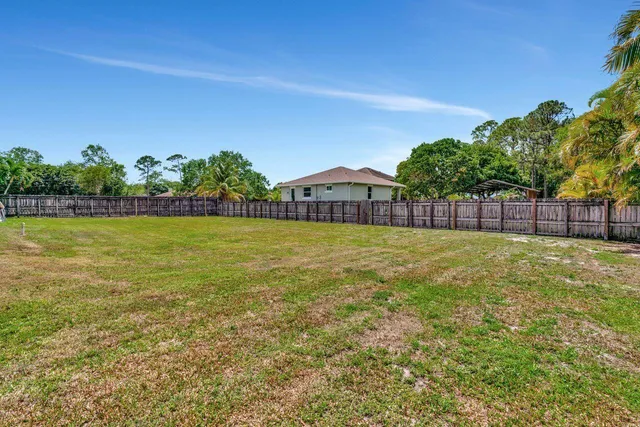 a view of a lake with a big yard