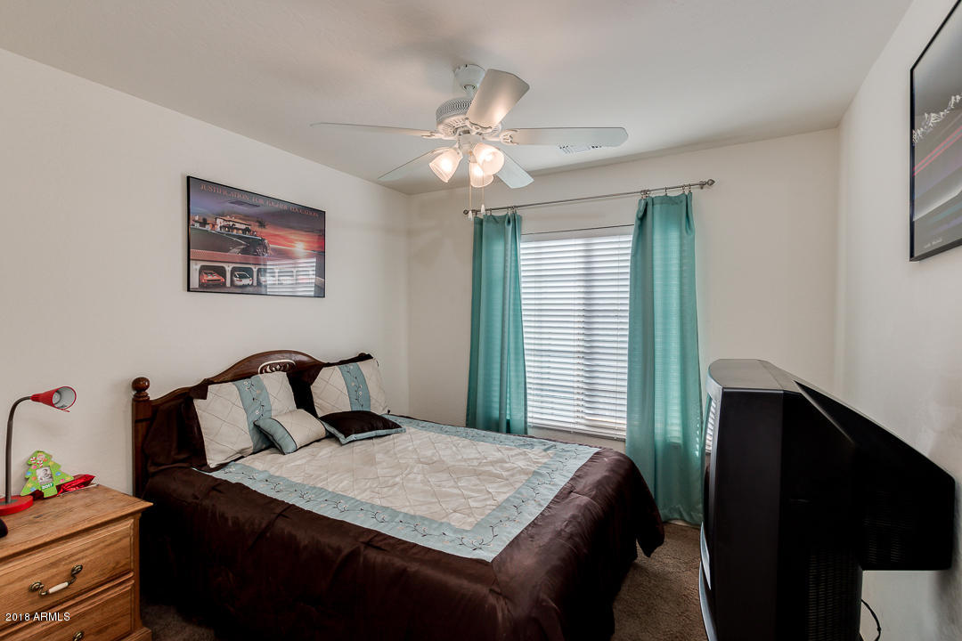 6664 East Refuge Road Florence, AZ 85132 - Photo 28 of 37 6664RefugeDownstairsBedroom#4