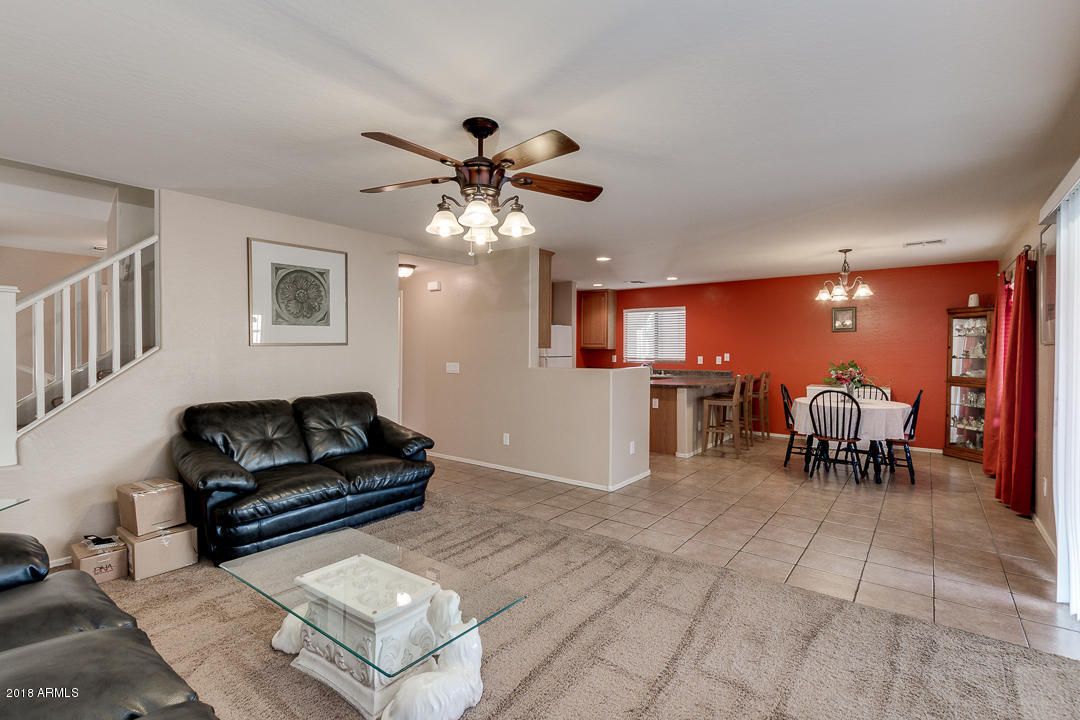 6664 East Refuge Road Florence, AZ 85132 - Photo 5 of 37 6664RefugeLivingroomKitchen