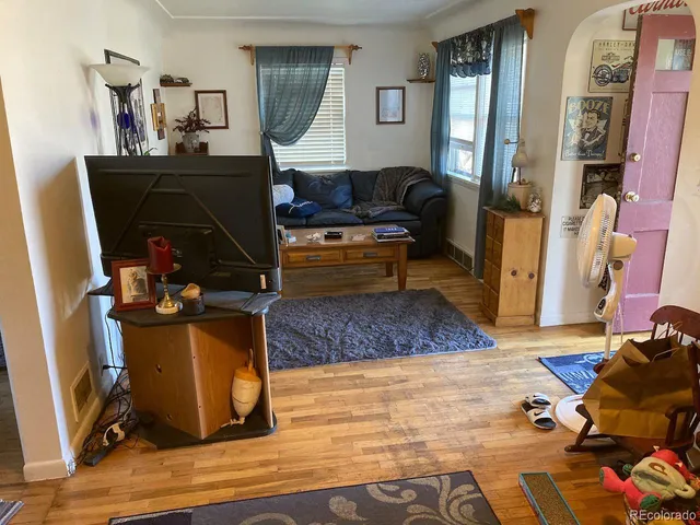 a kitchen with stainless steel appliances a stove sink and refrigerator