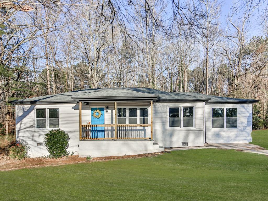 5205 Silhouette Lane Southwest Mableton, GA 30126 - Photo 1 of 21 front view of a house with a yard
