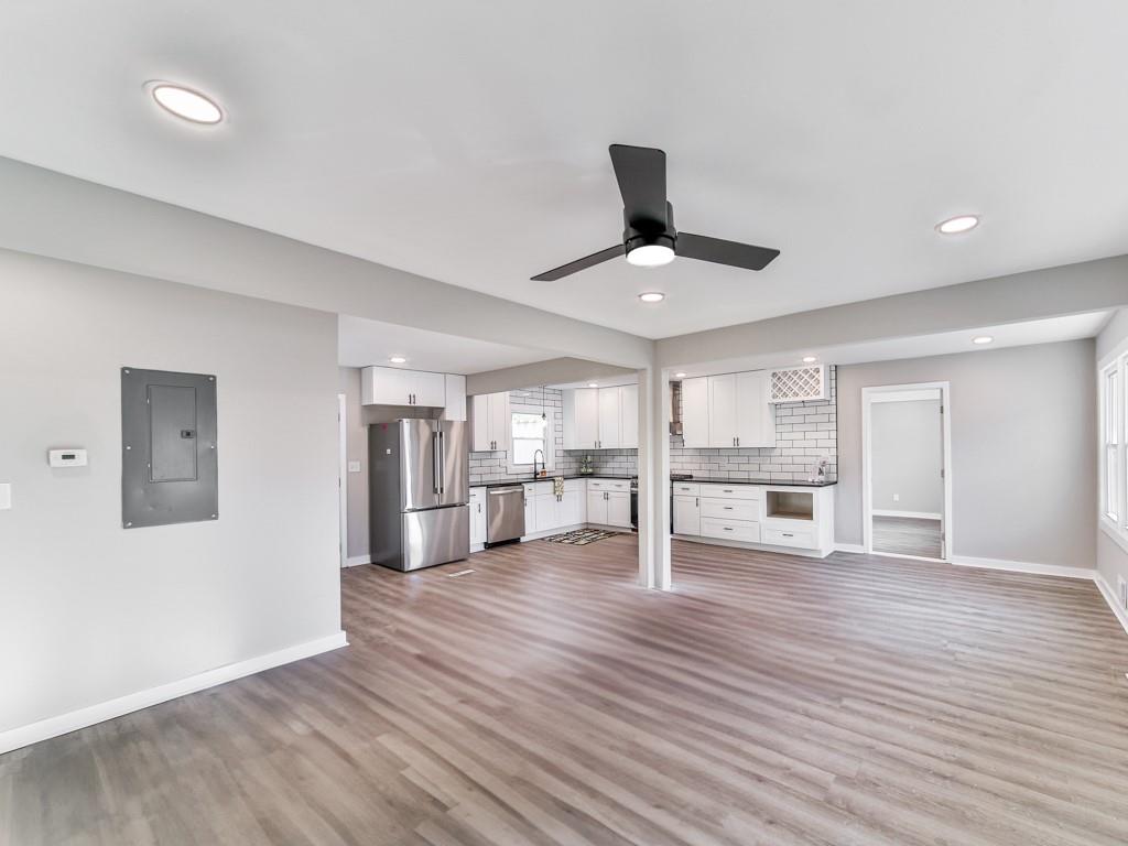 5205 Silhouette Lane Southwest Mableton, GA 30126 - Photo 8 of 21 a view of empty room with wooden floor and window