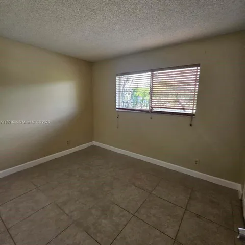 a bathroom with a sink a toilet and a bathtub