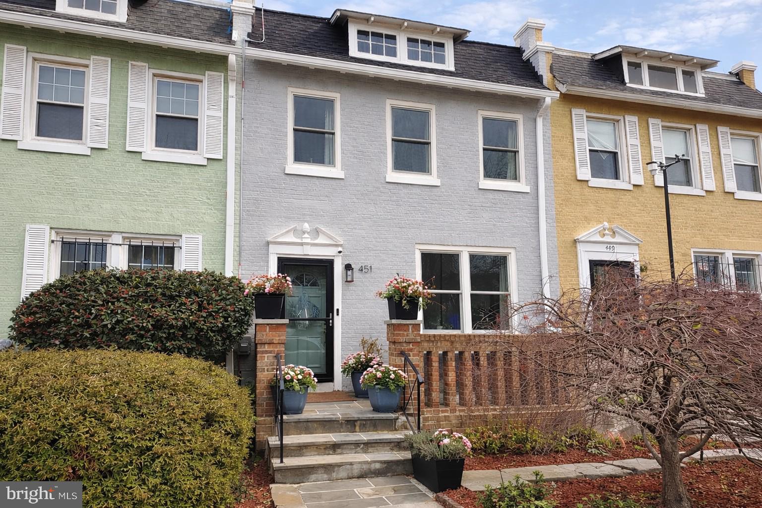 451 15th Street Northeast Washington, DC 20002 - Photo 1 of 1 a front view of a house with a yard