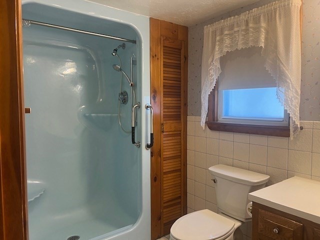 10 Deluca Road Milford, MA 01757 - Photo 20 of 37 a bathroom with a toilet and a shower