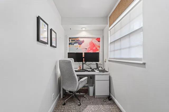 a room with furniture and wooden floor