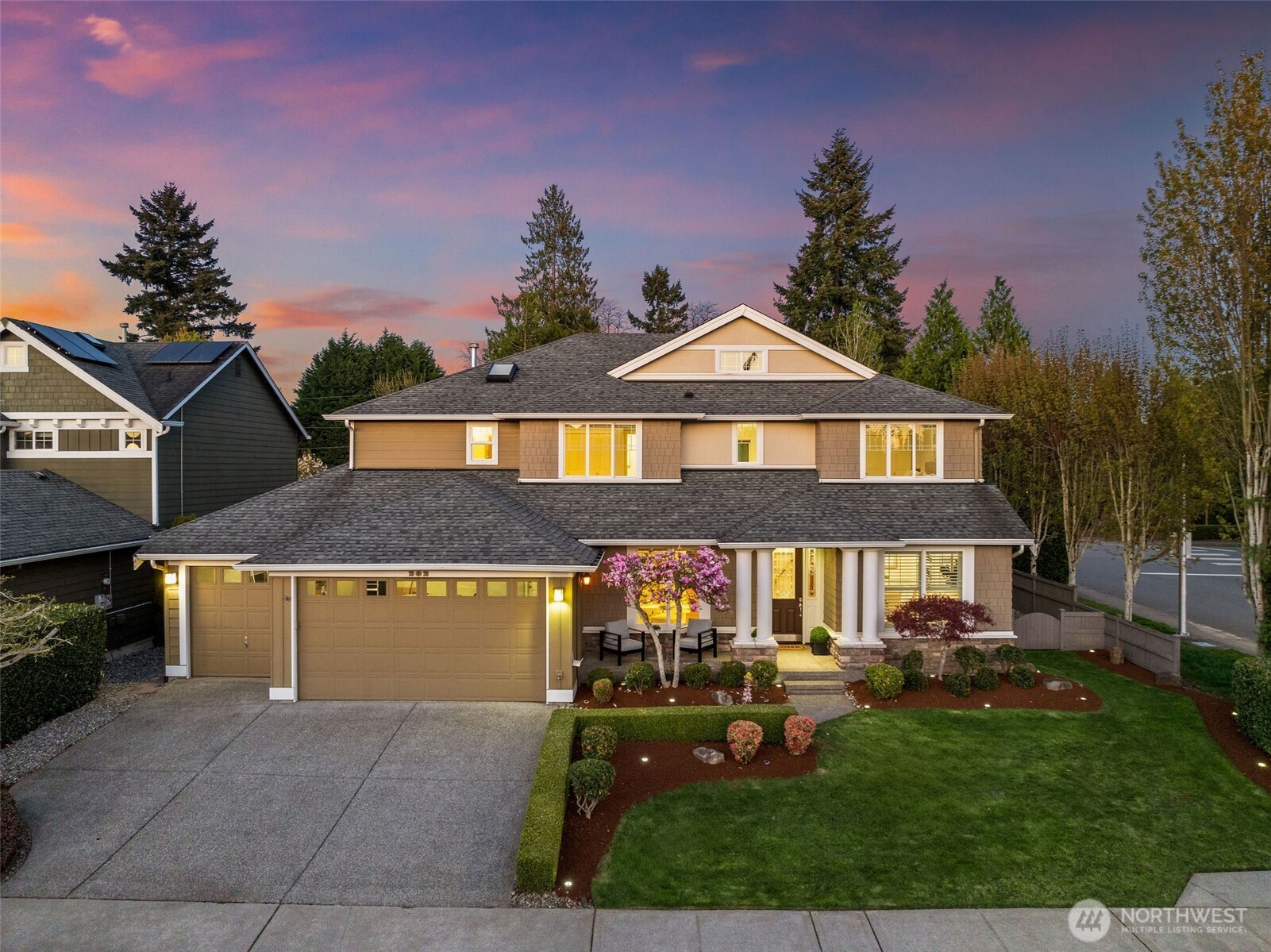 202 Chelan Court Northeast Renton, WA 98059 - Photo 1 of 40 a front view of a house with garden