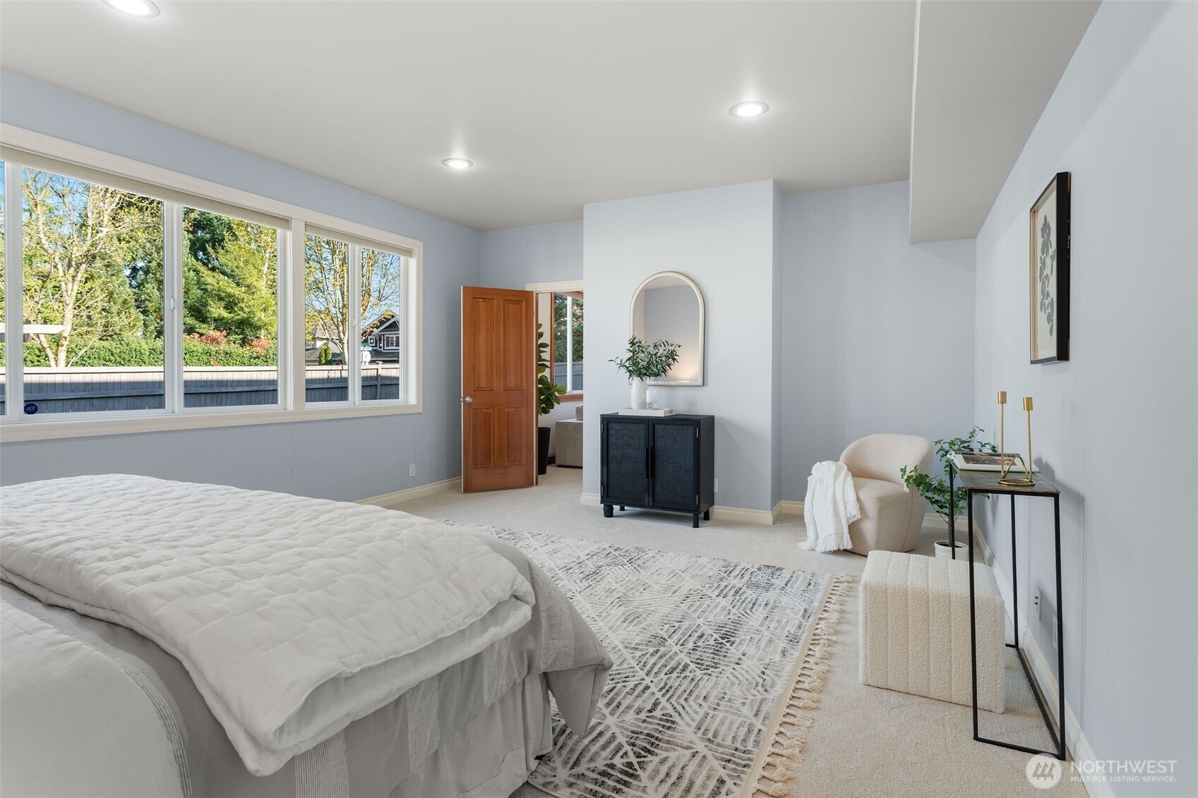 202 Chelan Court Northeast Renton, WA 98059 - Photo 16 of 40 a bed room with a bed and a television