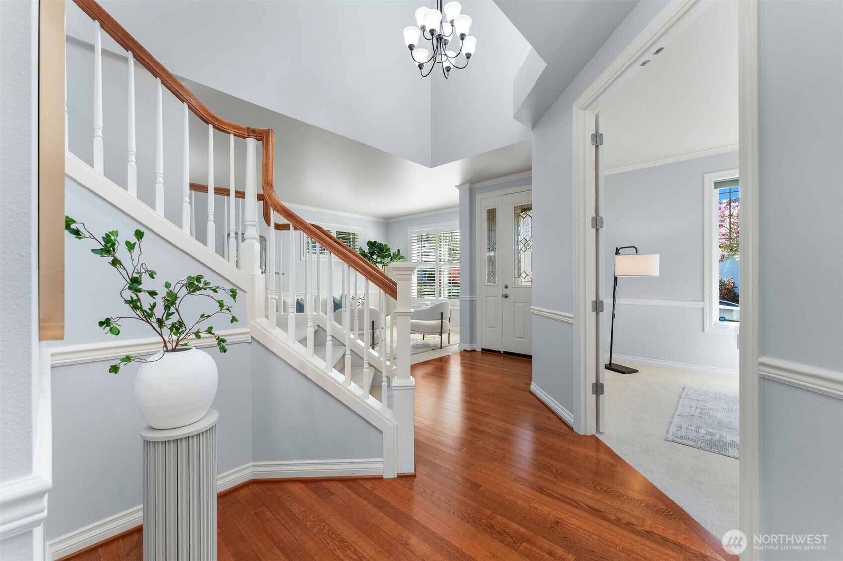 202 Chelan Court Northeast Renton, WA 98059 - Photo 17 of 40 a view of an entryway with wooden floor