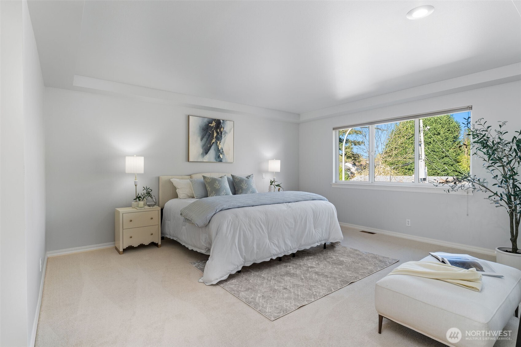 202 Chelan Court Northeast Renton, WA 98059 - Photo 20 of 40 a spacious bedroom with a bed and a window
