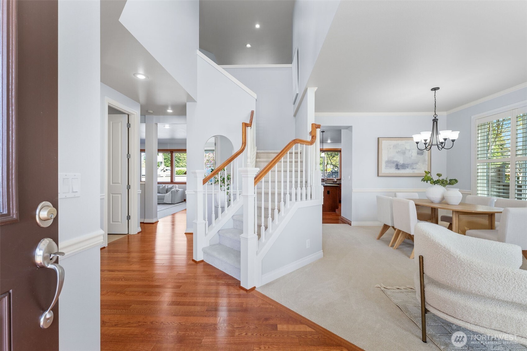 202 Chelan Court Northeast Renton, WA 98059 - Photo 2 of 40 an entryway with wooden floor and windows