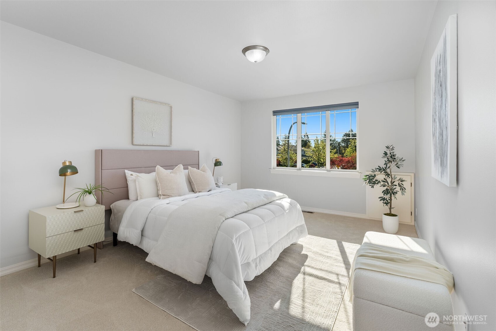202 Chelan Court Northeast Renton, WA 98059 - Photo 24 of 40 a bedroom with a bed and a couch