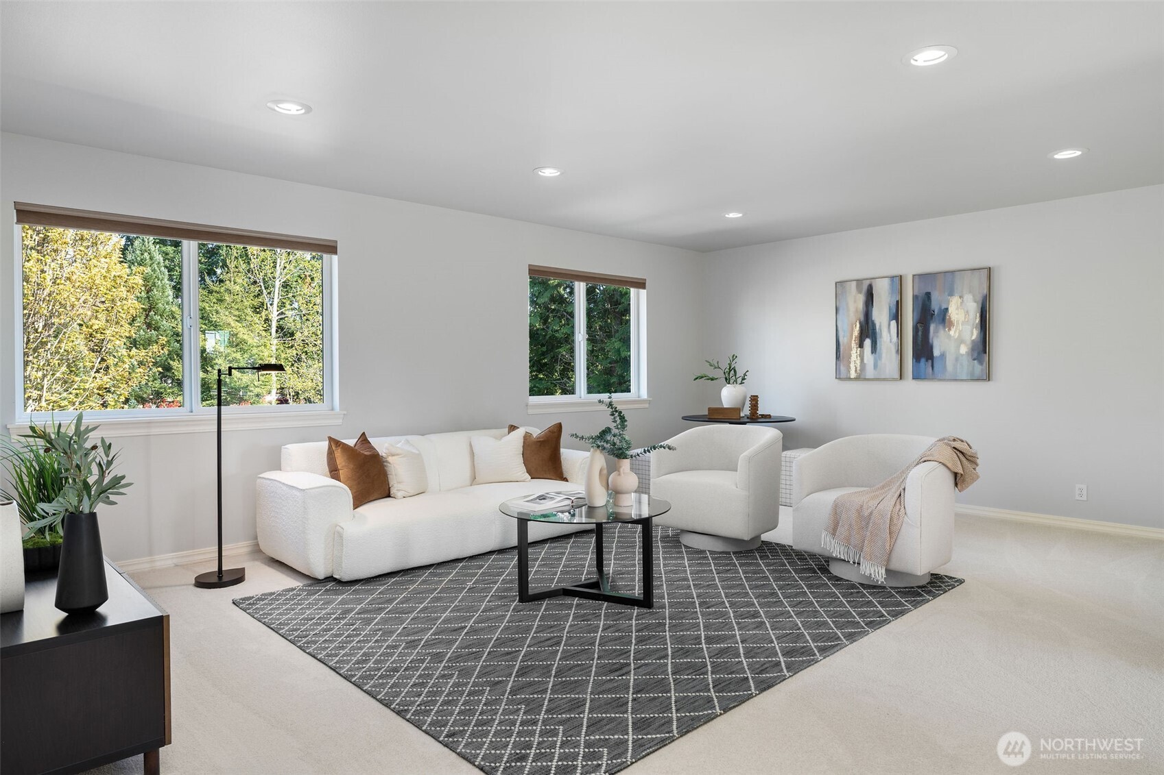 202 Chelan Court Northeast Renton, WA 98059 - Photo 25 of 40 a living room with furniture and a large window