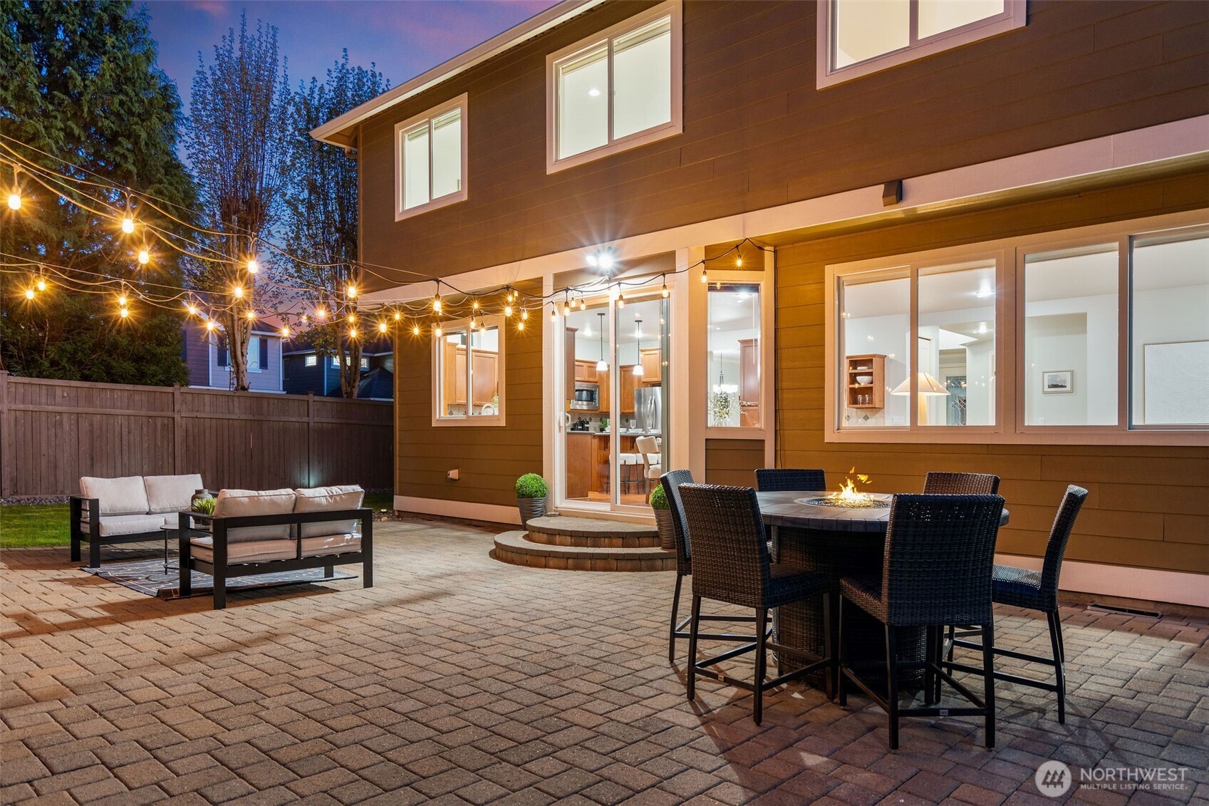 202 Chelan Court Northeast Renton, WA 98059 - Photo 33 of 40 a view of a patio with a dining table and chairs