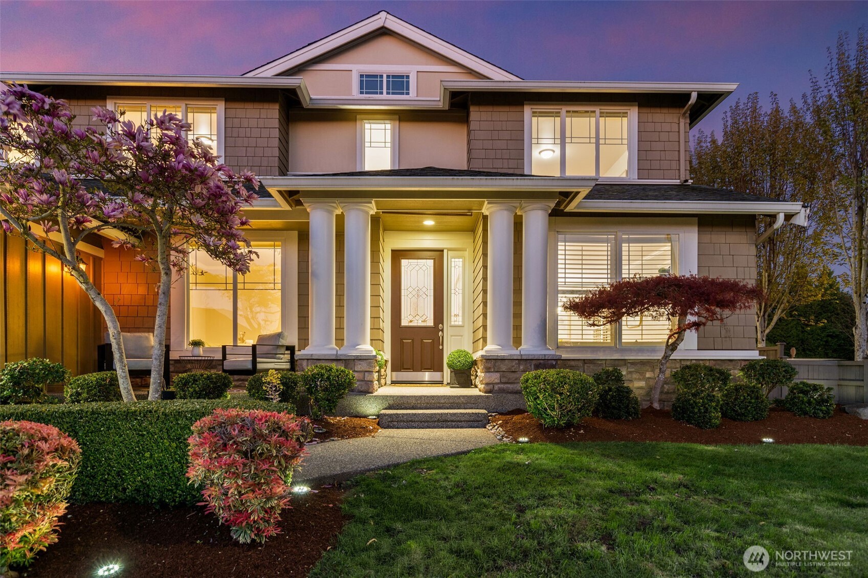 202 Chelan Court Northeast Renton, WA 98059 - Photo 35 of 40 a front view of a house with garden