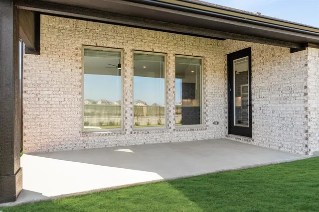 a living room with a garden and a patio