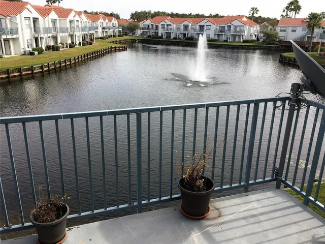 a view of a lake from a balcony