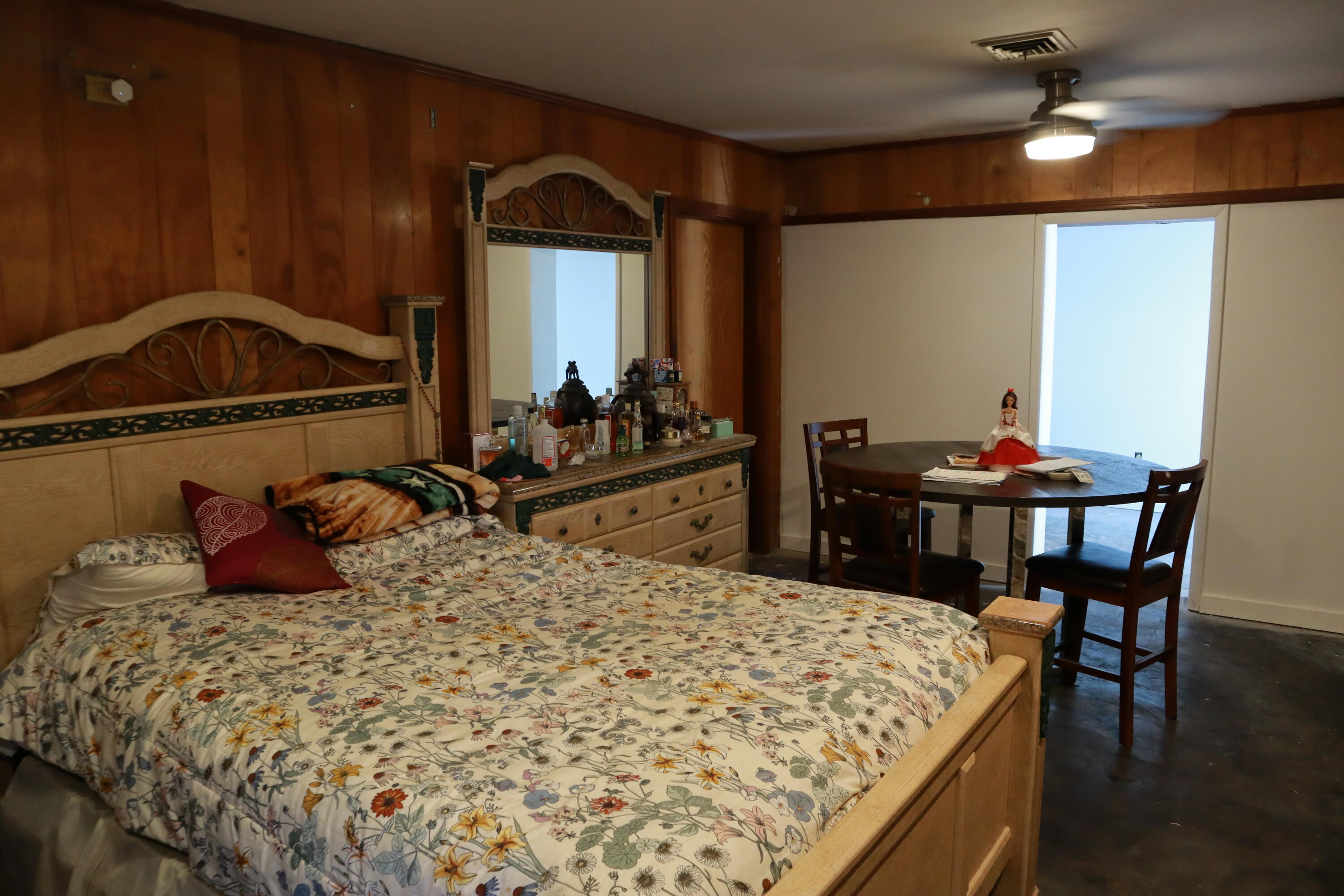 360 Kismet Avenue Pahokee, FL 33476 - Photo 16 of 100 a bed room with a bed and a chair