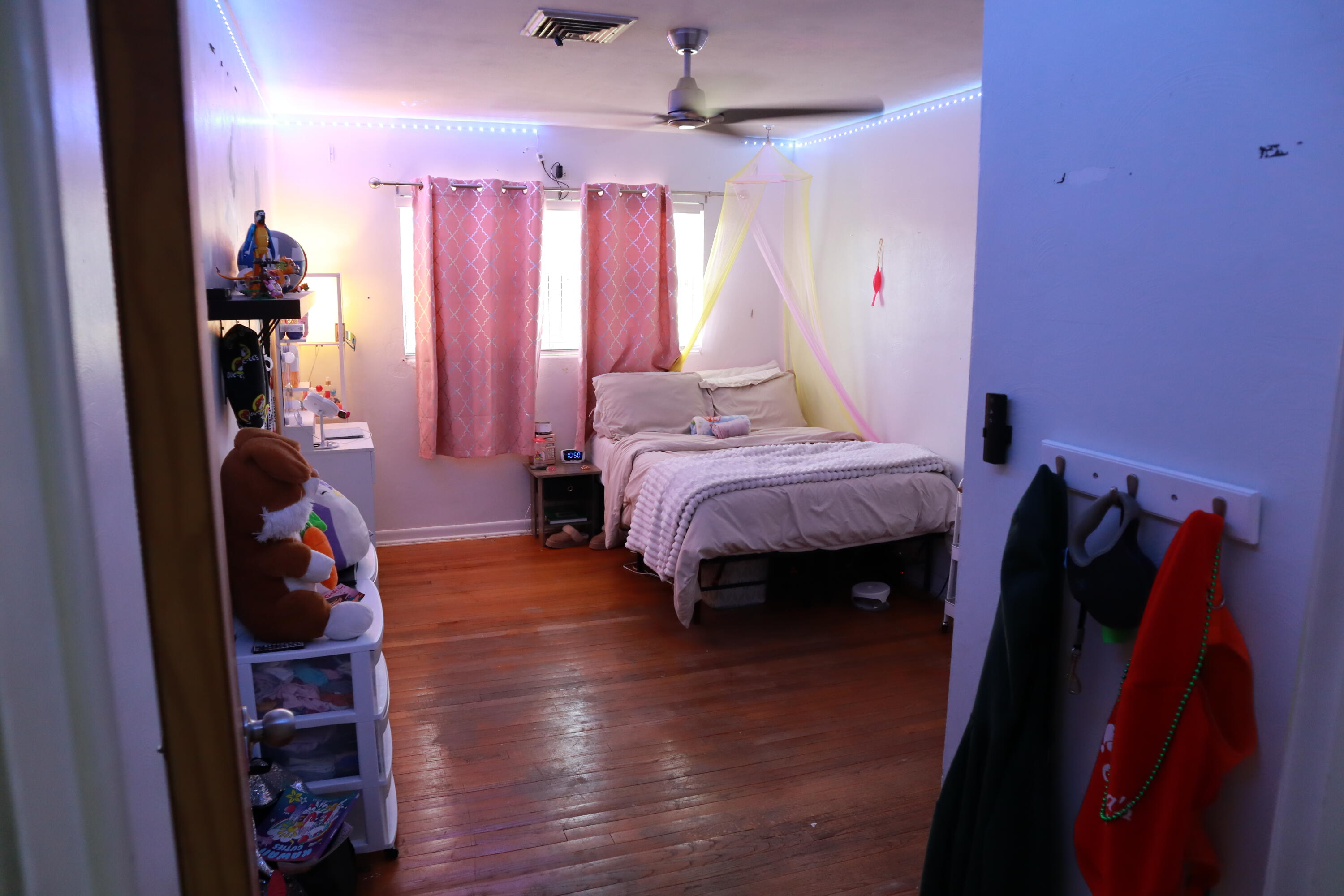 360 Kismet Avenue Pahokee, FL 33476 - Photo 17 of 100 a bed room with a bed and a walk in closet