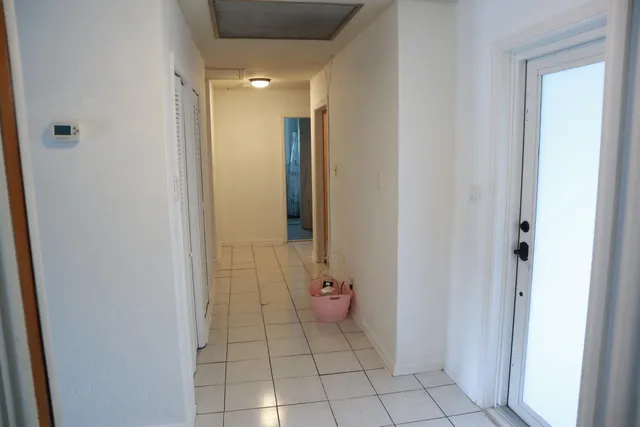 a kitchen with stainless steel appliances granite countertop a stove and a refrigerator