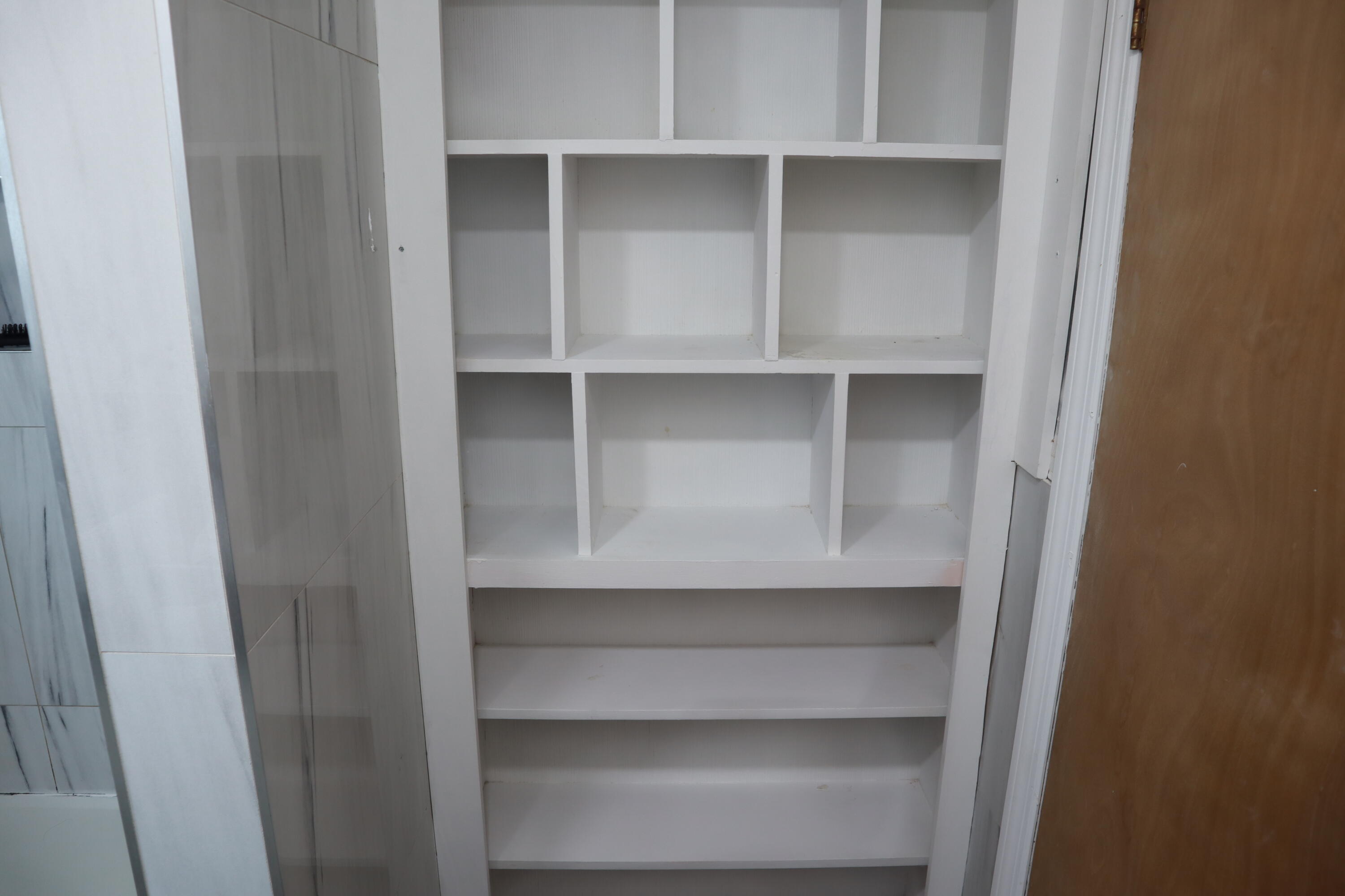 360 Kismet Avenue Pahokee, FL 33476 - Photo 30 of 100 a view of walk in closet with empty racks