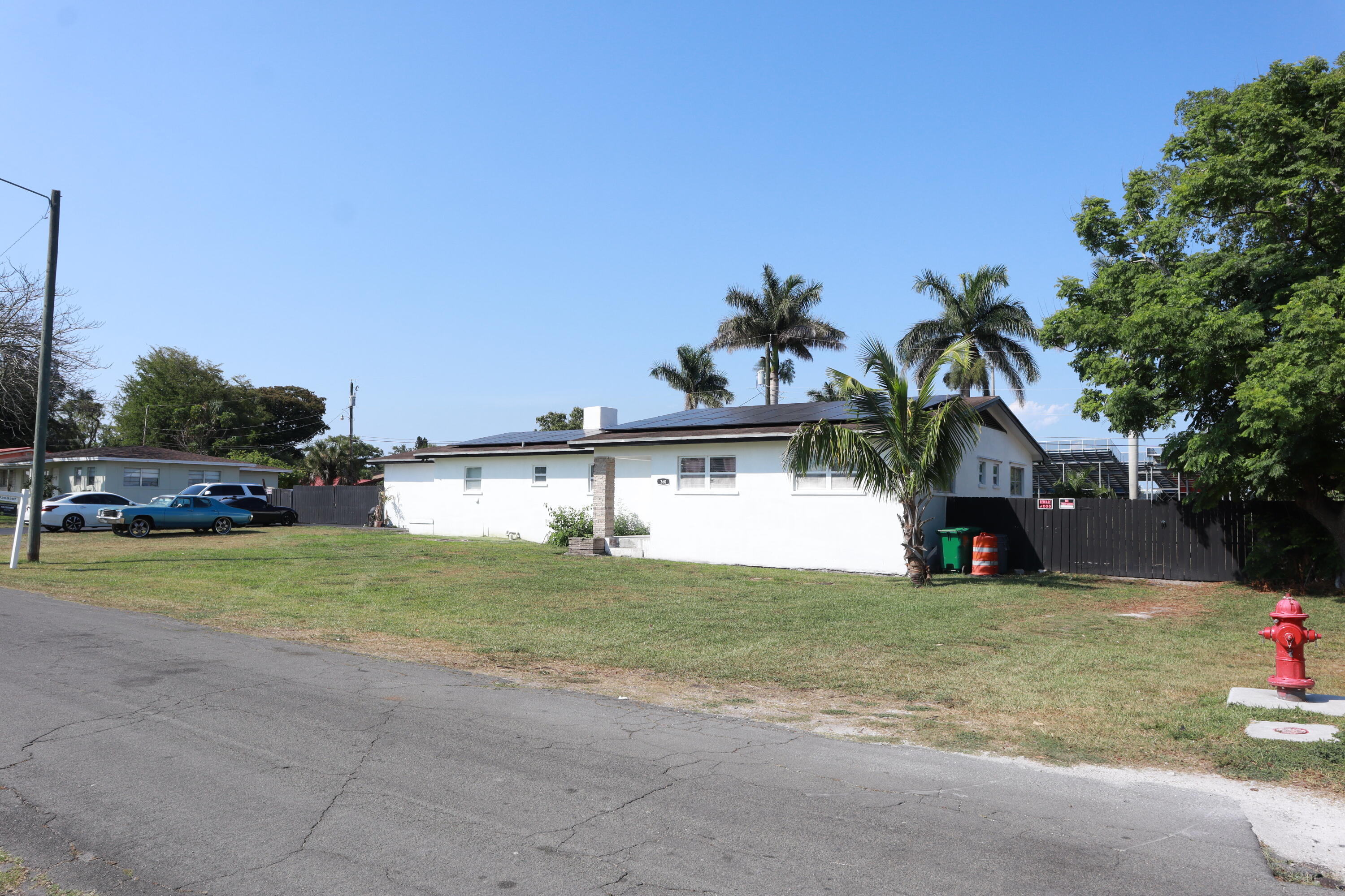 360 Kismet Avenue Pahokee, FL 33476 - Photo 64 of 100 a view of a house with a yard