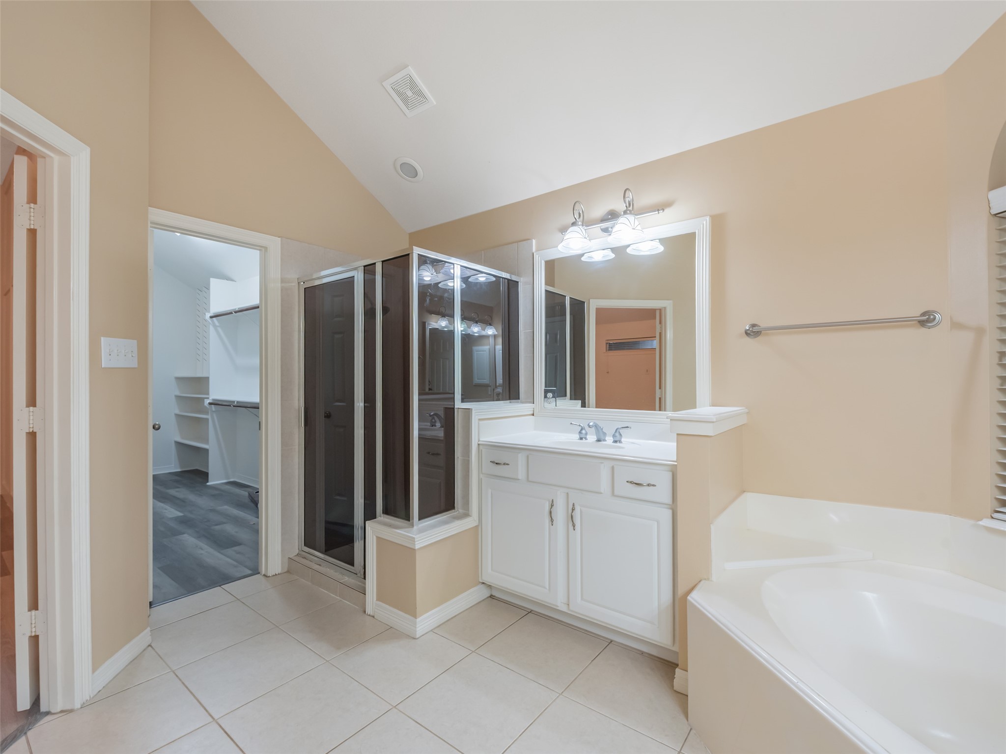 1511 Baldridge Lane Katy, TX 77494 - Photo 29 of 50 a bathroom with a bathtub sink and mirror