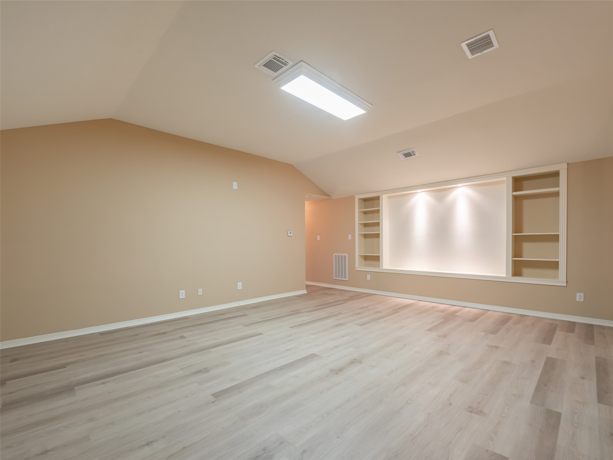 1511 Baldridge Lane Katy, TX 77494 - Photo 35 of 50 a view of an empty room with wooden floor and a window