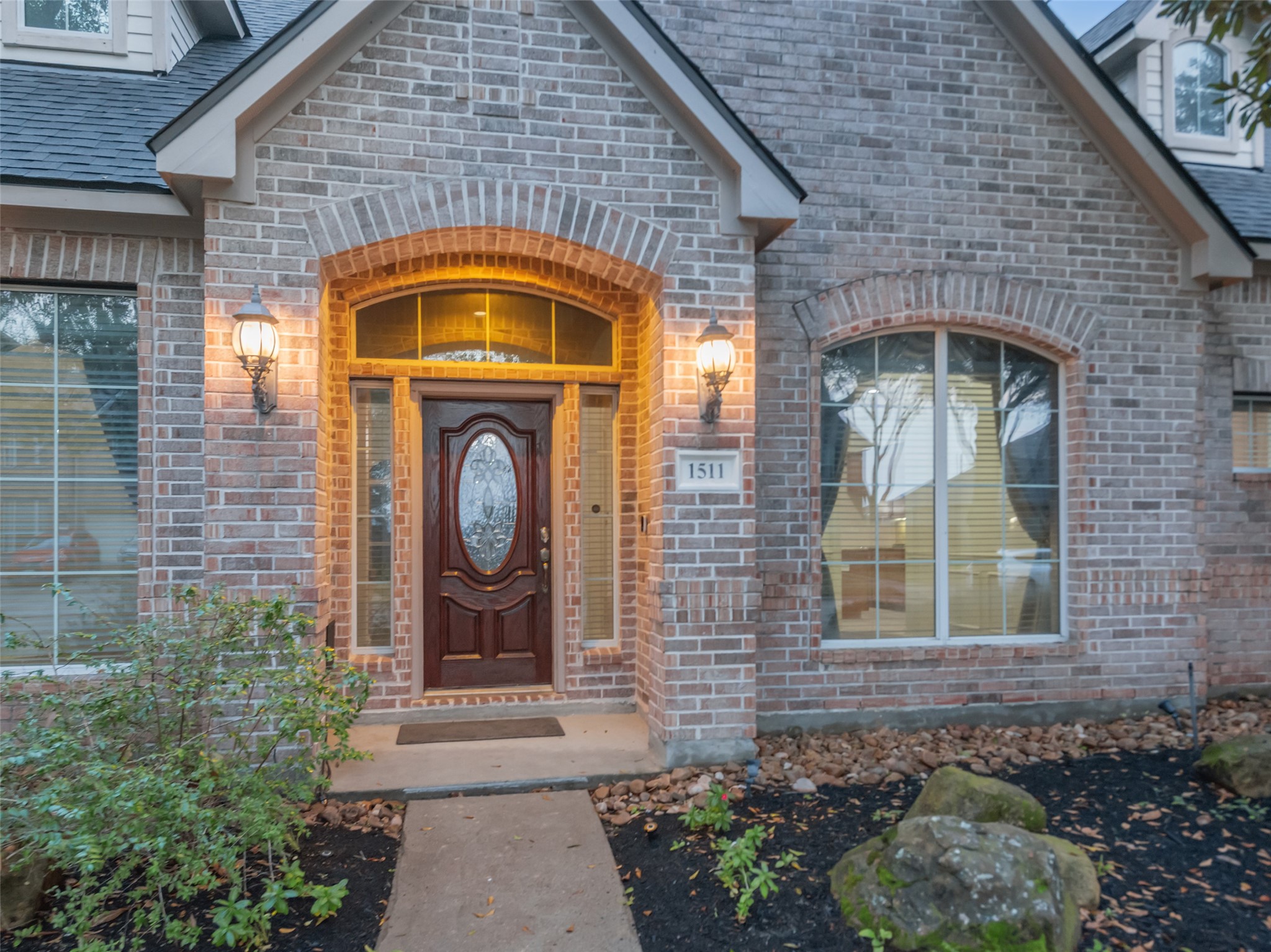 1511 Baldridge Lane Katy, TX 77494 - Photo 4 of 50 a front view of a house with garden