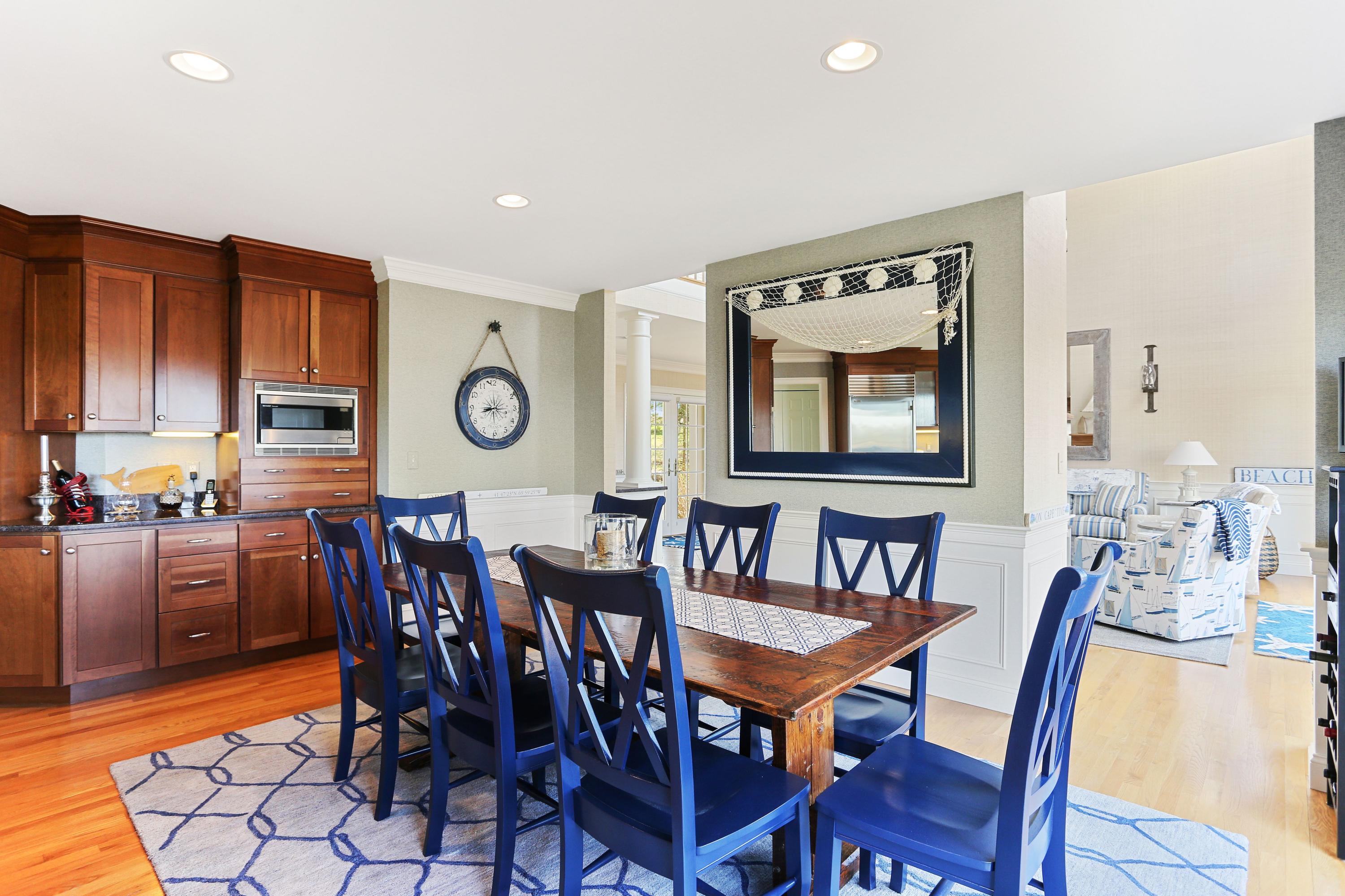 31 Ruggles Road Orleans, MA 02653 - Photo 18 of 61 a view of a a dining room with furniture window and wooden floor