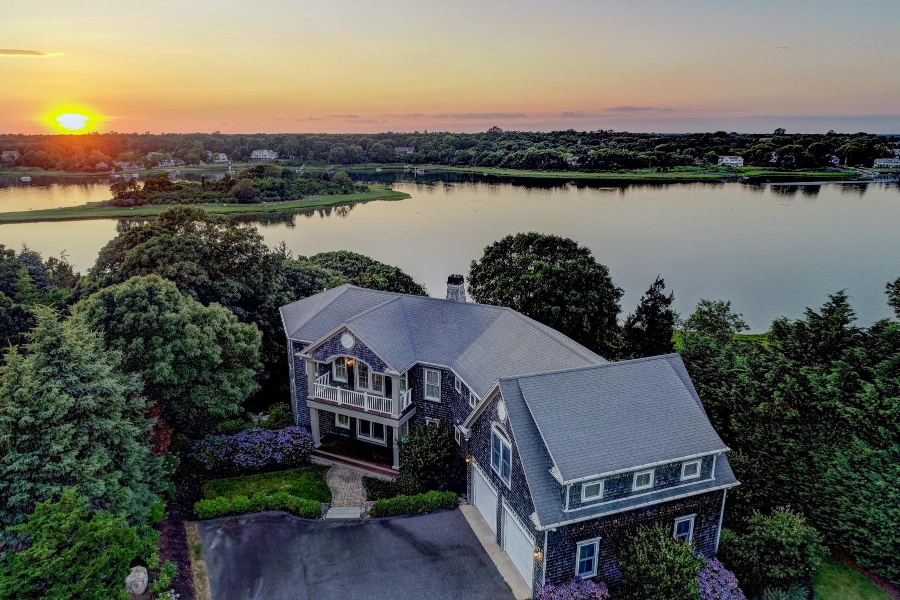 31 Ruggles Road Orleans, MA 02653 - Photo 54 of 61 a aerial view of a house next to a lake view