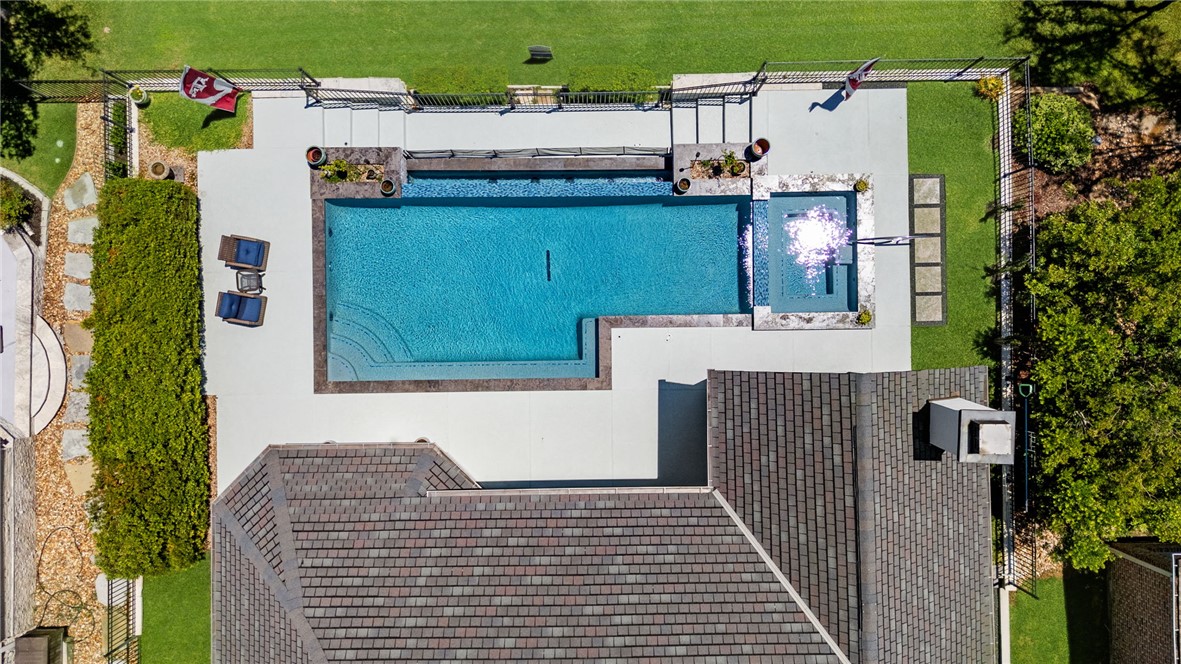 2833 Persimmon Ridge Court Bryan, TX 77807 - Photo 11 of 50 a buildings with trees in front of it