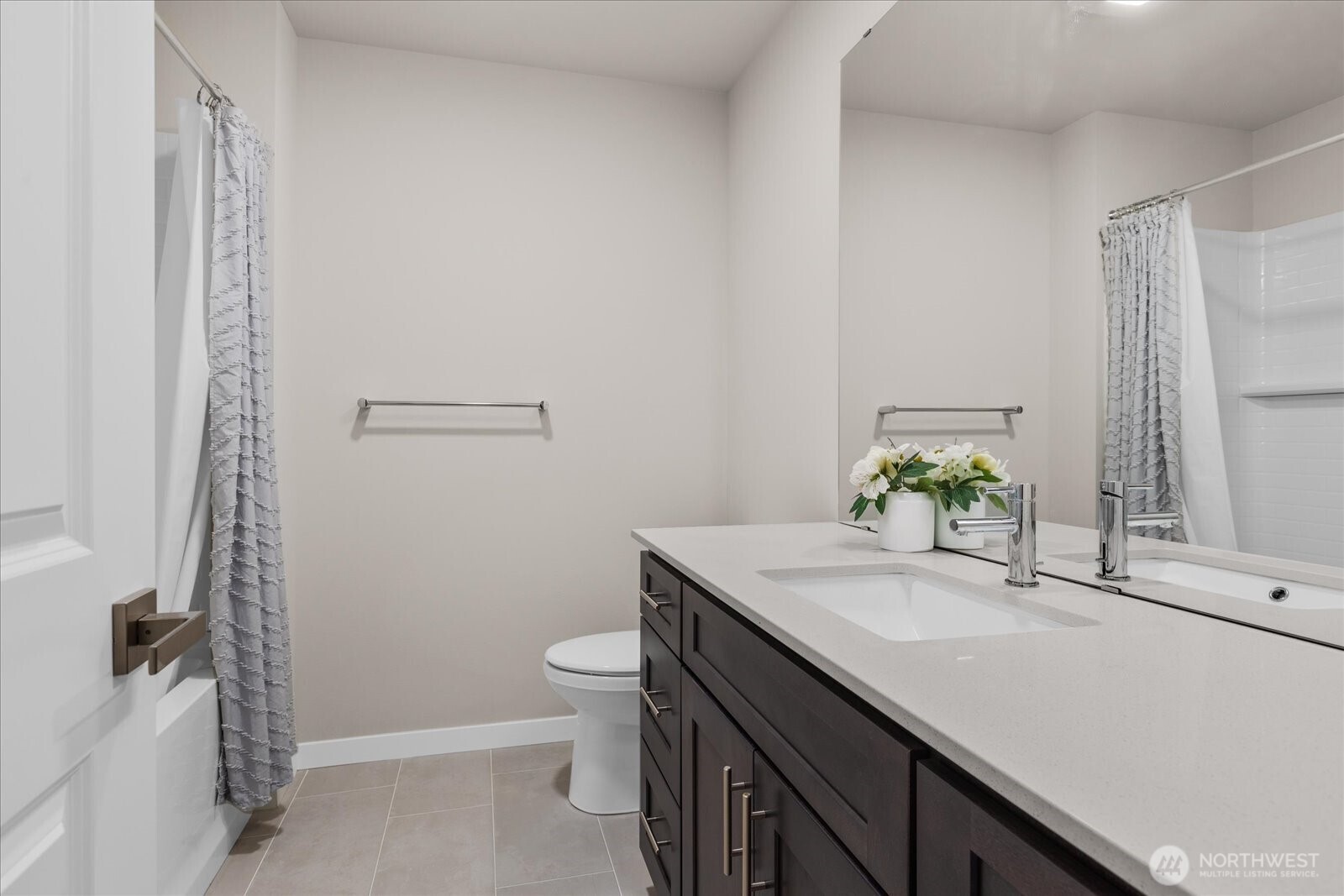 23413 Edmonds Way, Unit A2 Edmonds, WA 98026 - Photo 24 of 40 a bathroom with a sink and a mirror